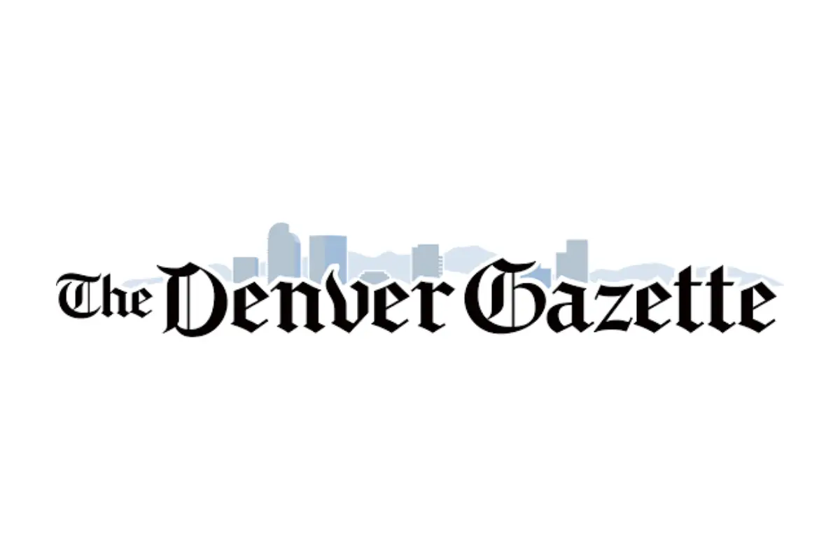 Denver Gazette Logo Denver Gazette Logo; black text on white background in front of city skyline