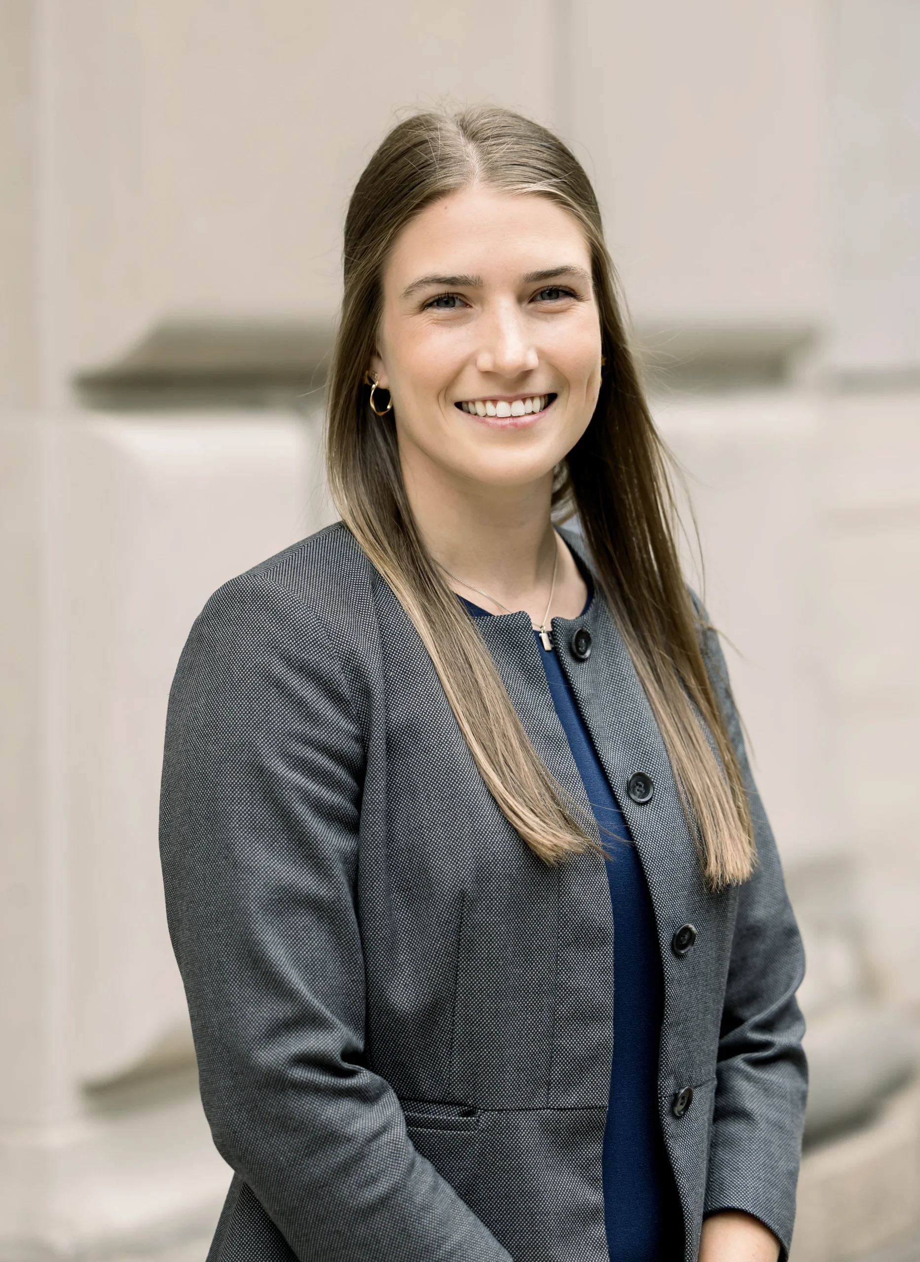 A company headshot photo of a woman