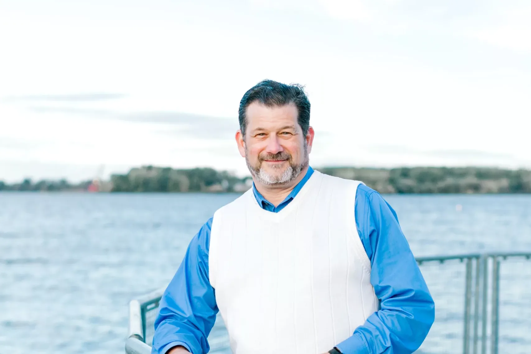 Kiddo_Website Thumbnail Mark Kiddo, lead plaintiff in Kiddo v. AFSCME, Local 2206, standing on an observation deck with Lake Erie behind him.