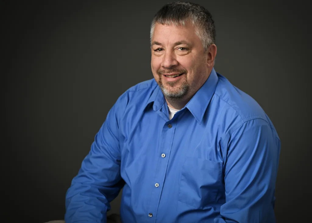Cory Yedlosky sitting on a chair