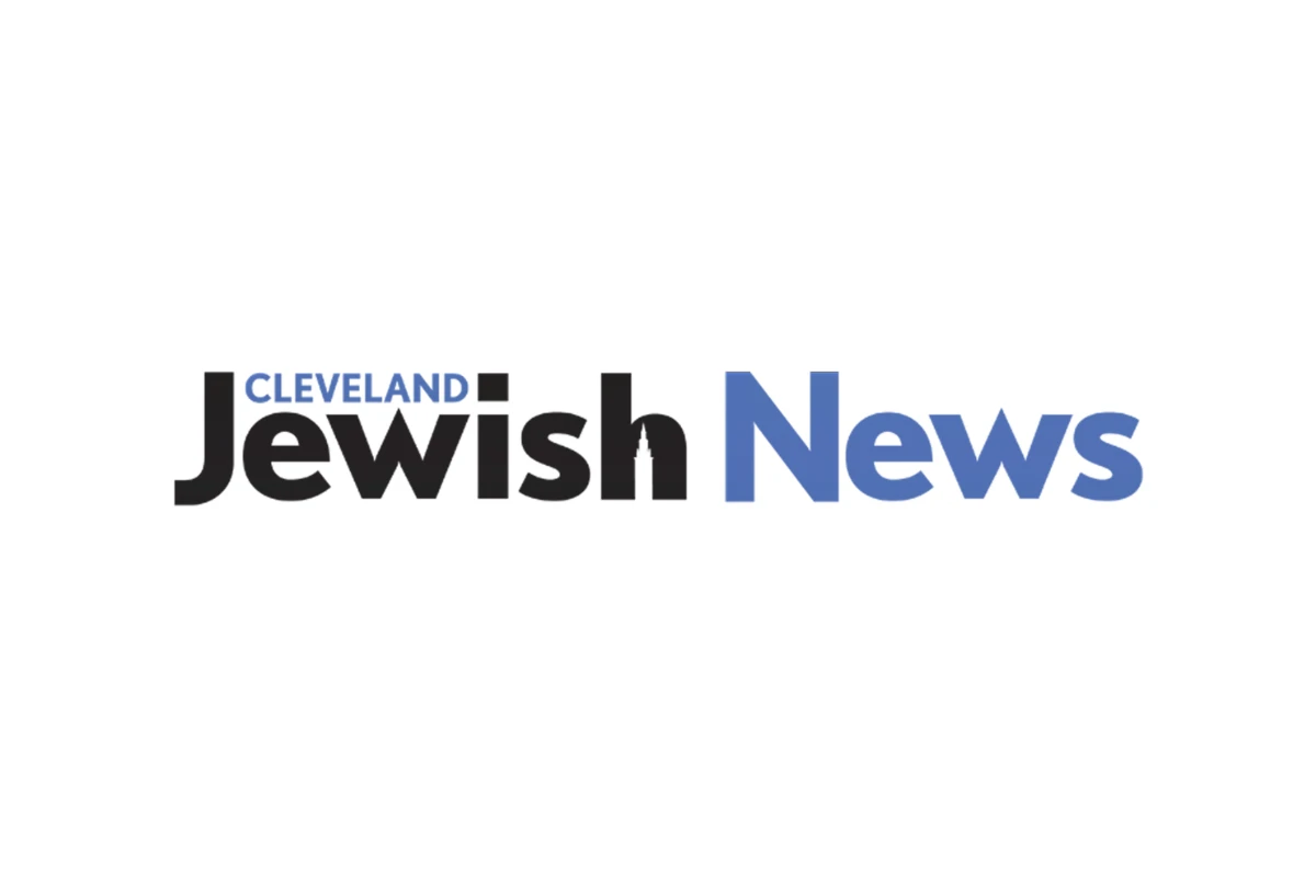 The logo of the Cleveland Jewish News; black and blue lettering on white background