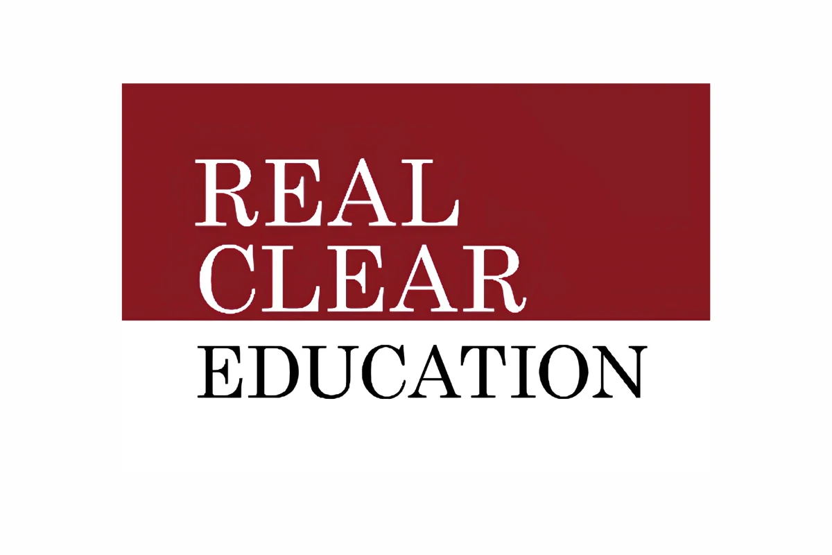 The logo of RealClear Education; black and white text on red and white background